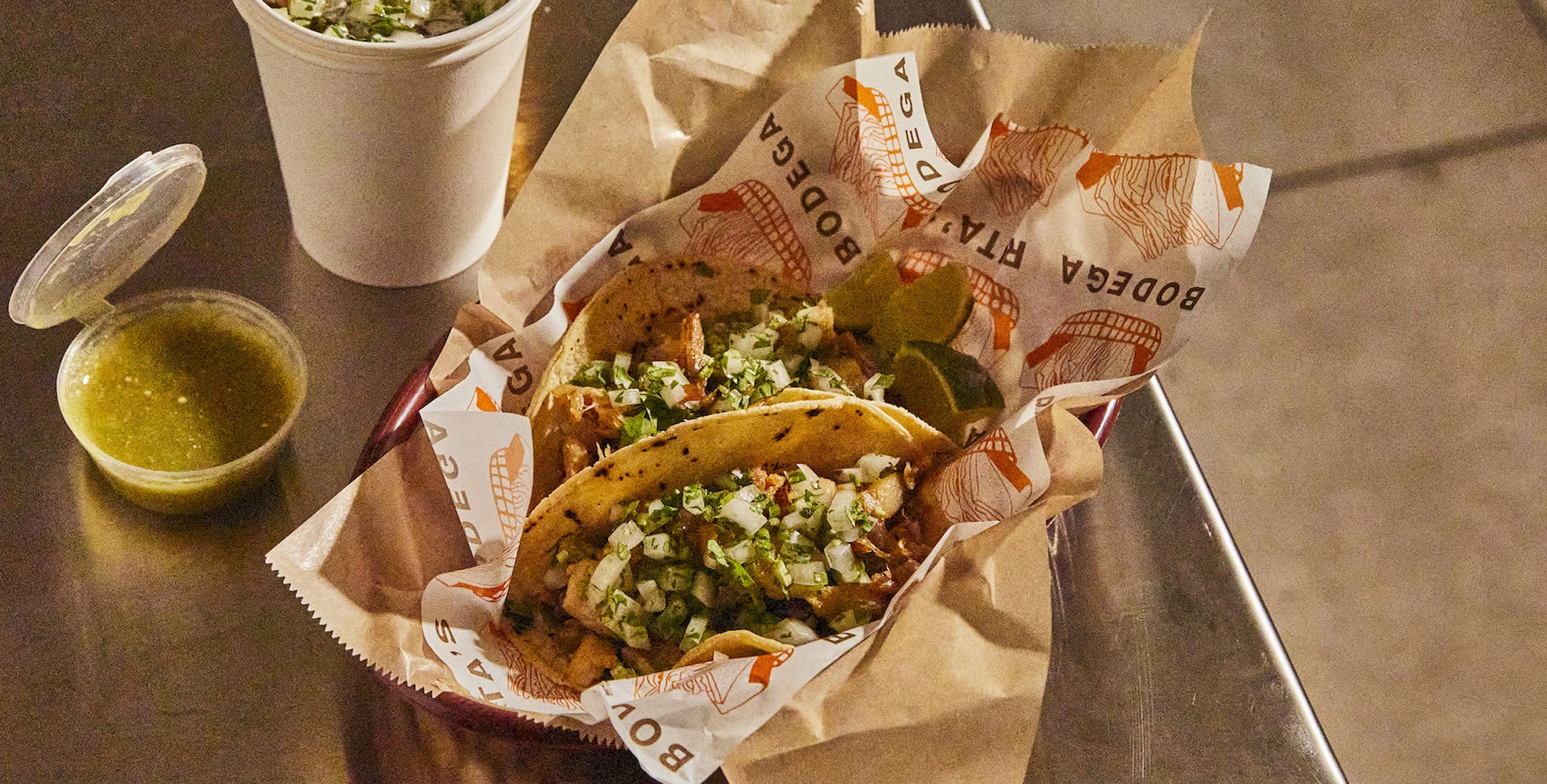 Tacos made with Maia Farms’ mycelium-based protein, topped with fresh onion and cilantro, served with salsa verde and lime — sustainable, plant-forward street food alternative.